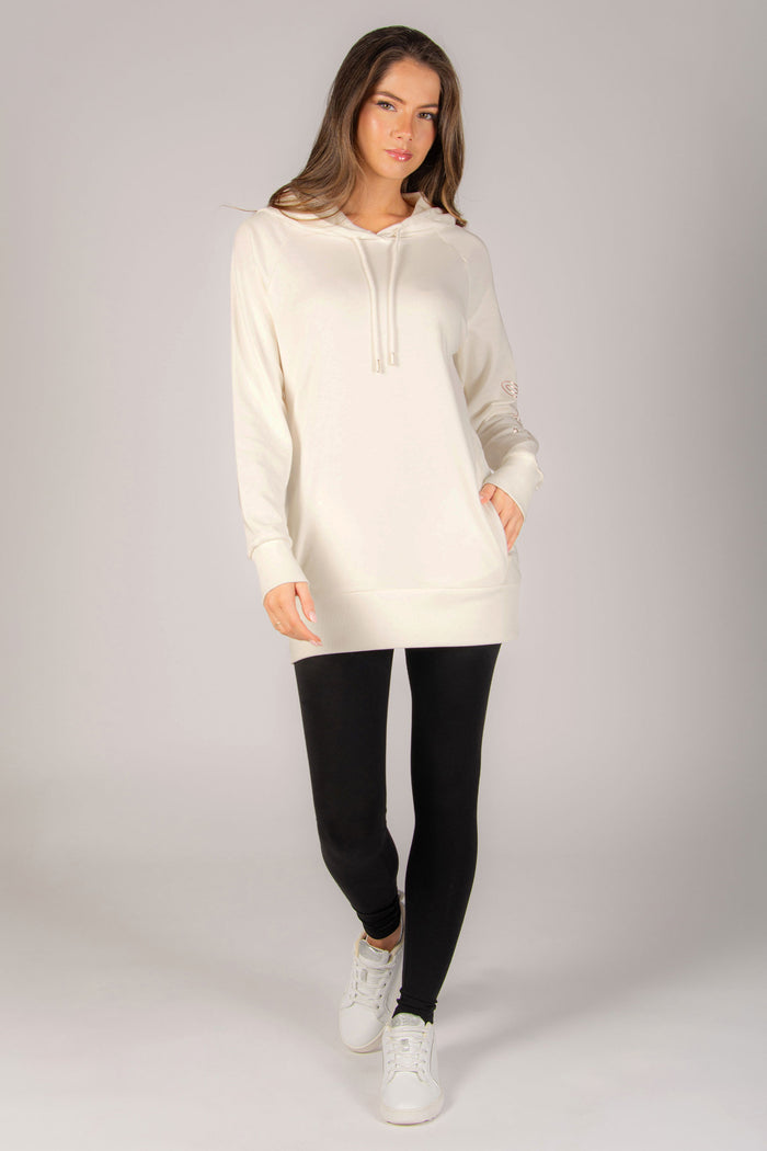 Cream hoodie for women with pockets and large hood, longline fit.