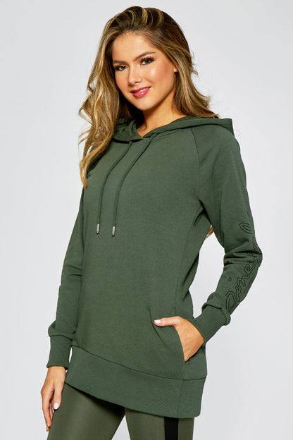 Kianna Louise wearing khaki oversized hoodie with pockets