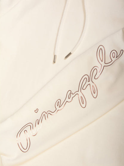 Detail shot of the sleeve and drawcords on this cream longline hoodie by Pineapple Dance Fashion.