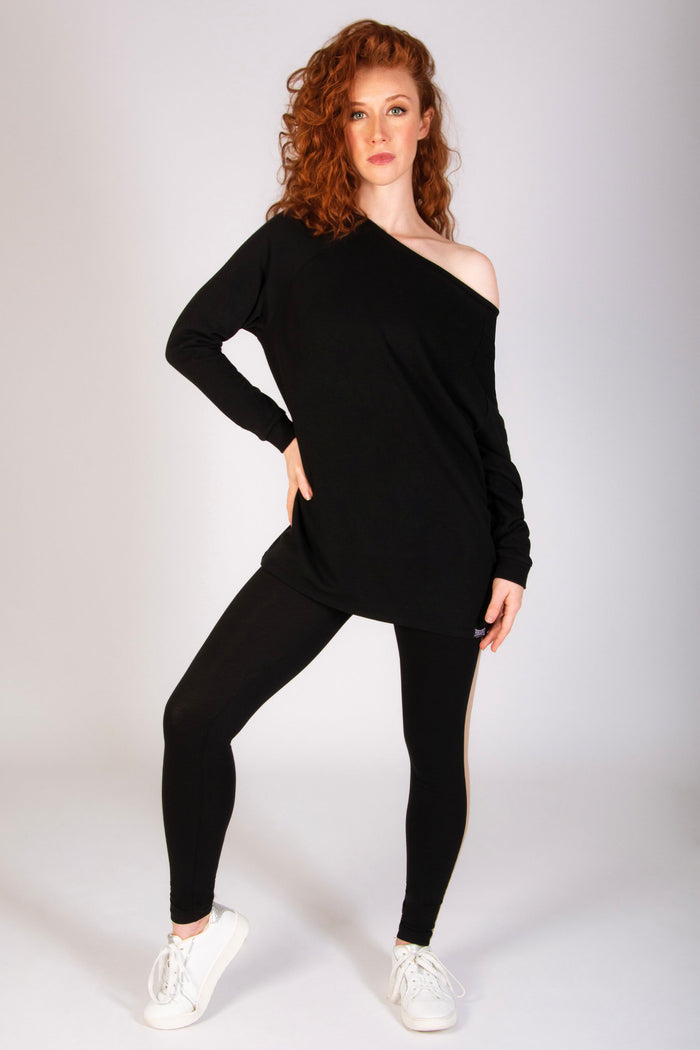 Women's longline off-shoulder sweater in black by Pineapple Dance Studios