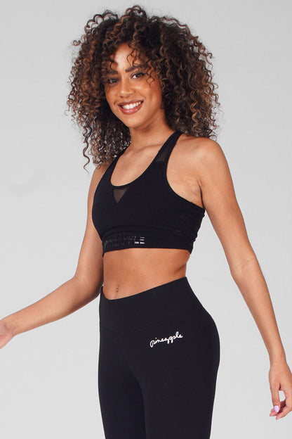 Woman wearing Black Mesh Bra Top with logo band