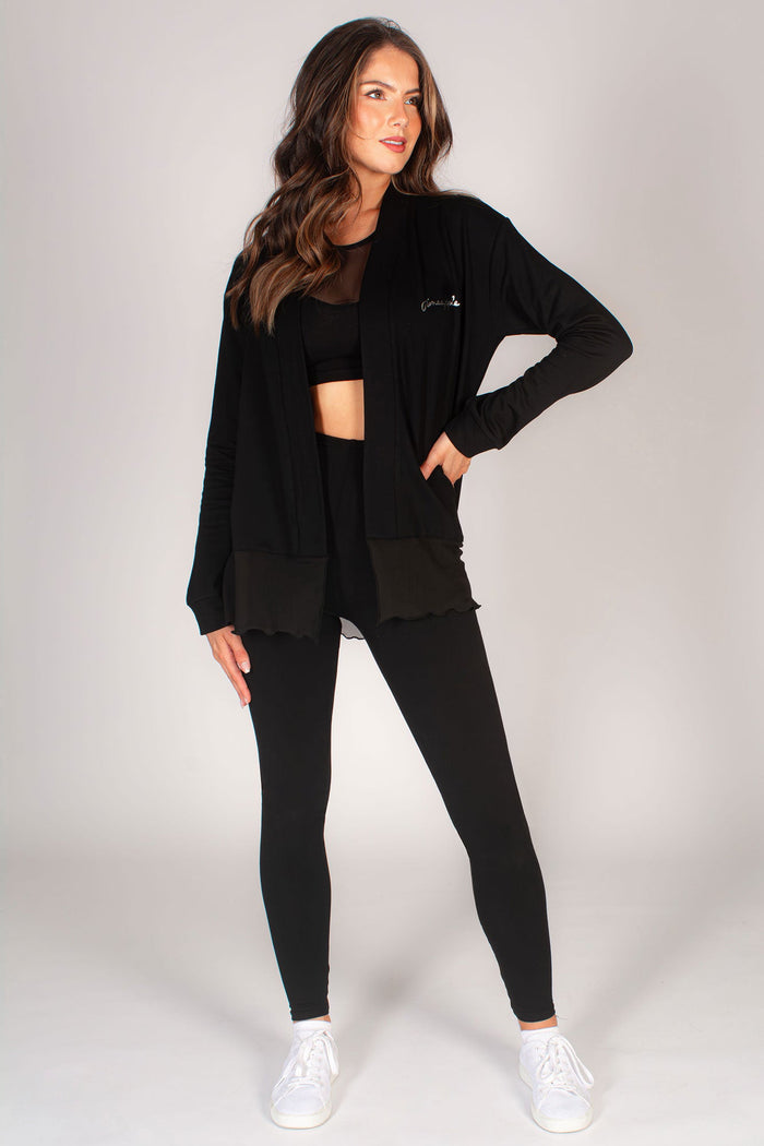 Kianna Louise wearing Pineapple black mesh cardigan with matching black mesh leggings