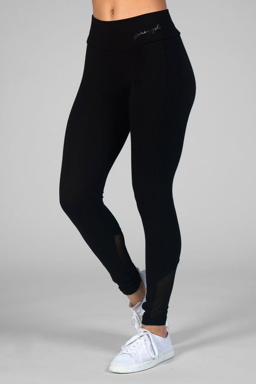 Woman wearing Pineapple black Monroe Leggings