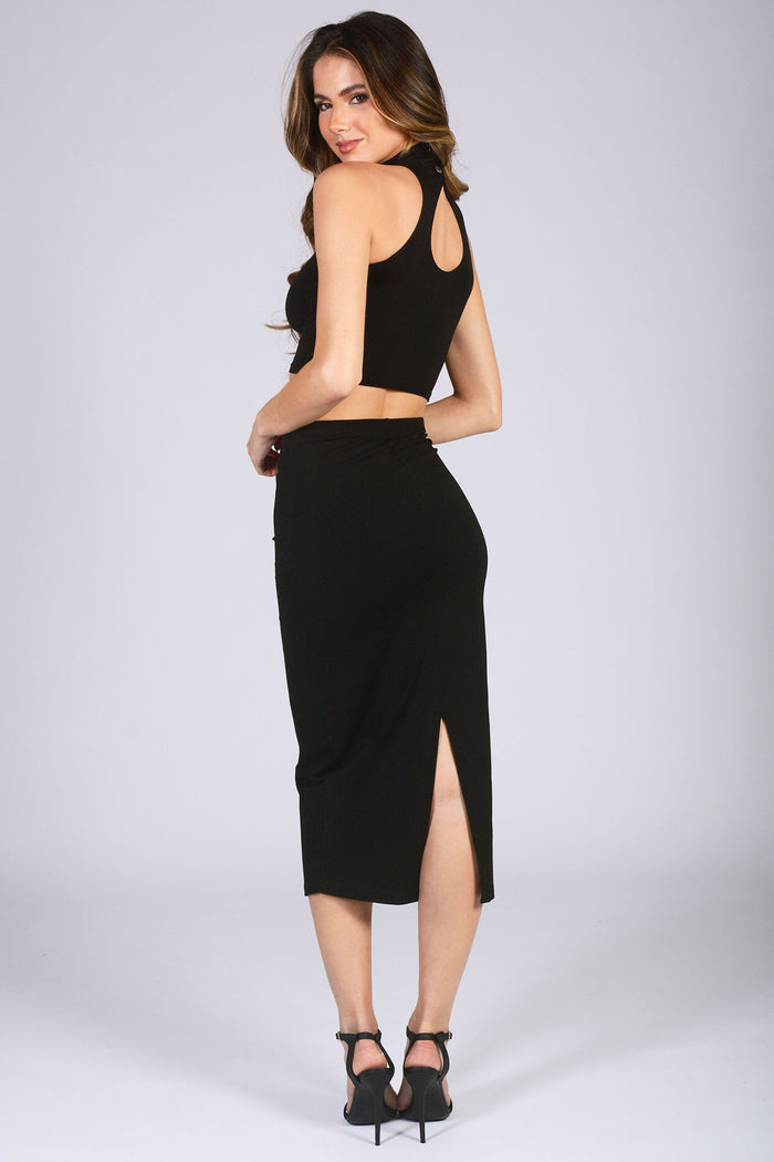 Kianna Louise wearing black midi skirt with turtle neck crop top