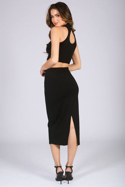 Kianna Louise wearing black midi skirt with turtle neck crop top