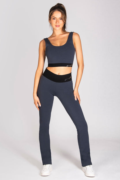 Midi yoga crop top in charcoal colour paired with bootcut yoga pants