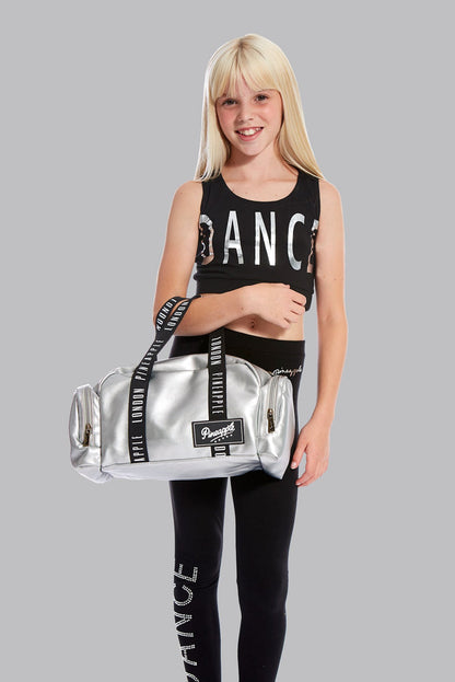 Girl carrying Pineapple Dance Silver Mini Covent Garden Dancer Bag