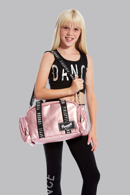 Girl carrying Pineapple Mini Covent Garden Pink Dancer Bag