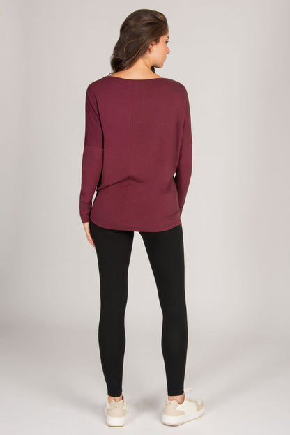 women's burgundy long sleeve top with scoop back and fitted sleeves