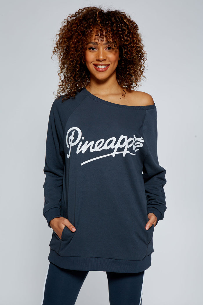 Woman wearing Pineapple Charcoal Monster Sweater
