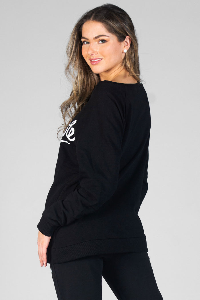 Woman wearing black Monster Sweatshirt