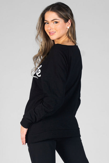 Woman wearing black Monster Sweatshirt