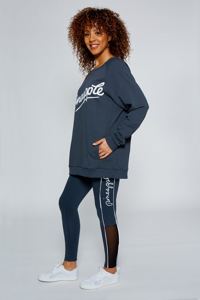 Woman wearing Charcoal Monster Sweater