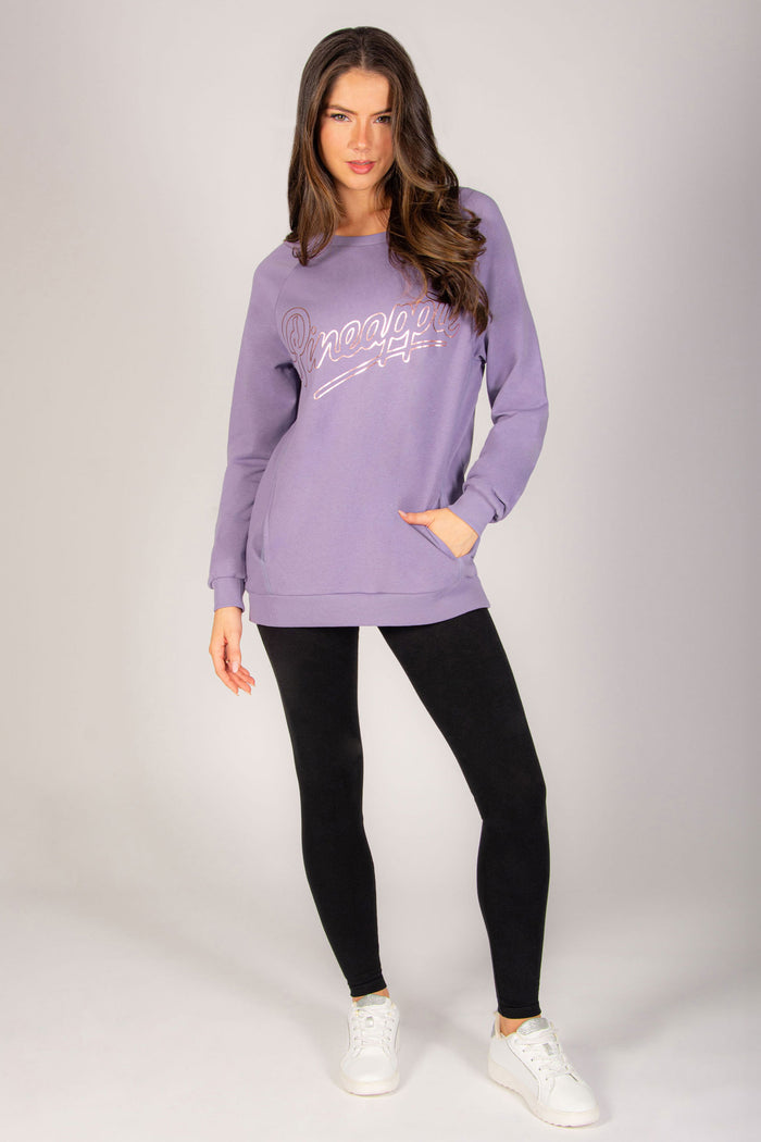 Light purple super oversized sweatshirt for women with hidden pockets and wide neckline.