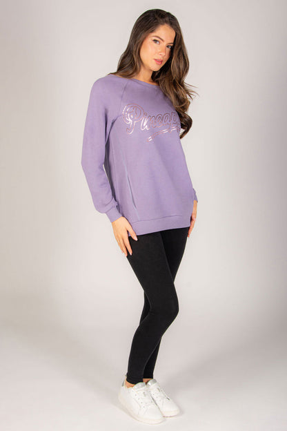 Light purple super oversized sweat top for women with pockets made out of soft cotton-rich fabric.