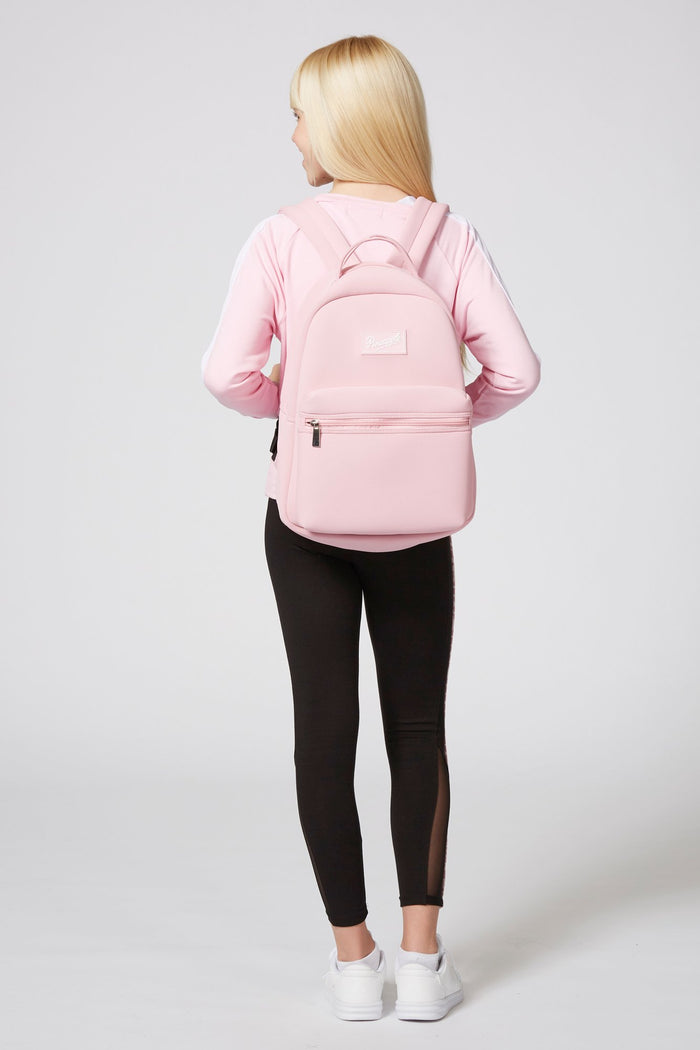 Girl carrying Neoprene Backpack with adjustable straps