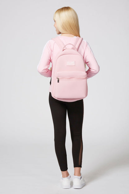 Girl carrying Neoprene Backpack with adjustable straps