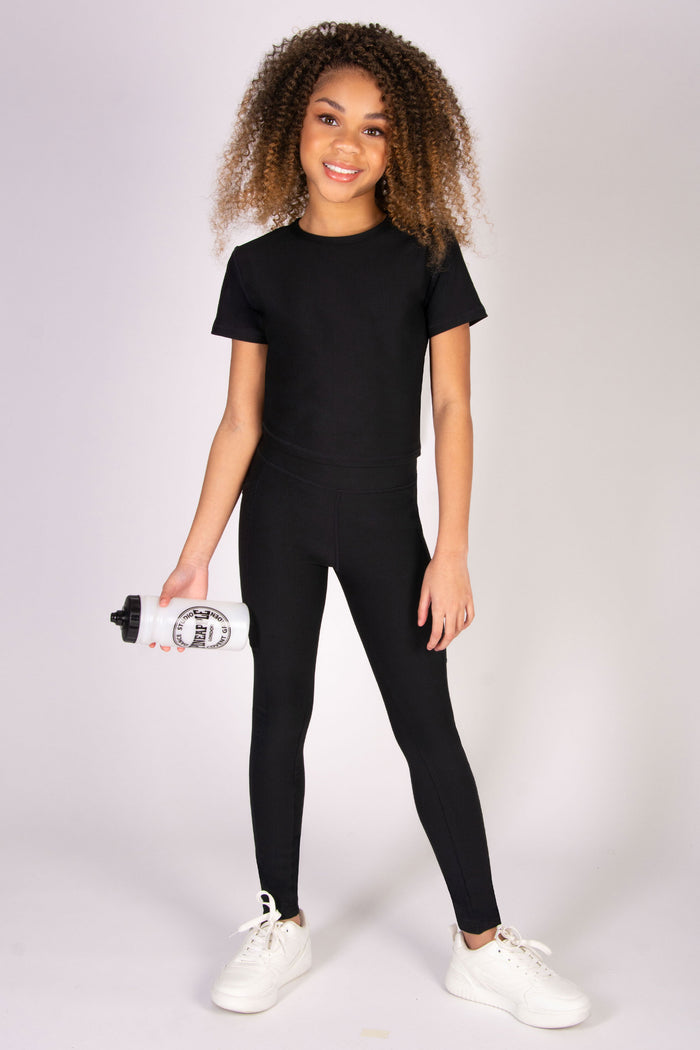 Skylar Blu wearing rib black activewear leggings with matching rib t-shirt