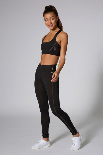 Woman wearing Pineapple Black Performance Leggings