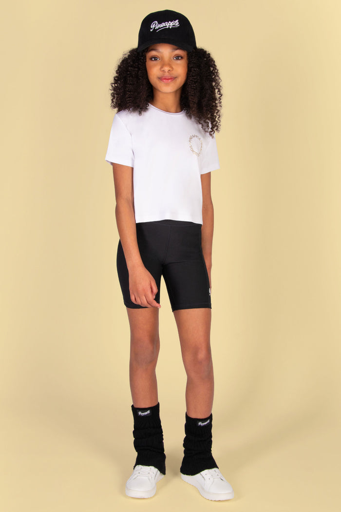 girl's white t-shirt with short sleeves and a boxy fit