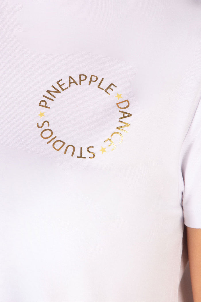 Close up detail shot of the foil print saying 'Pineapple Dance Studios'.