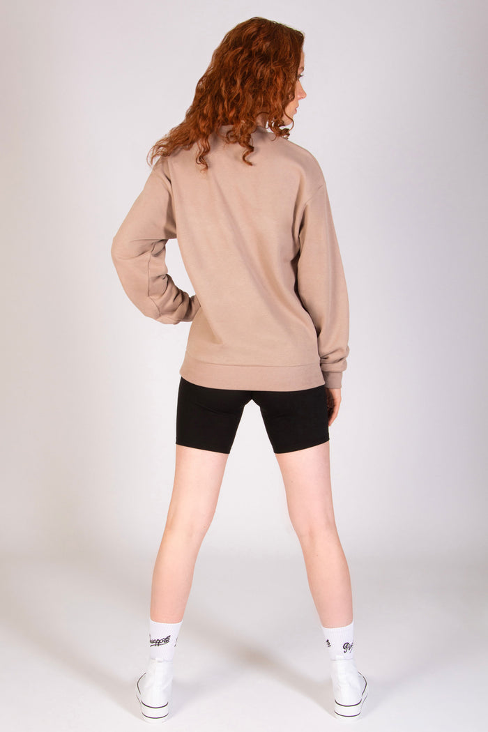 Women's light brown oversized sweat top by Pineapple Dance Studios.