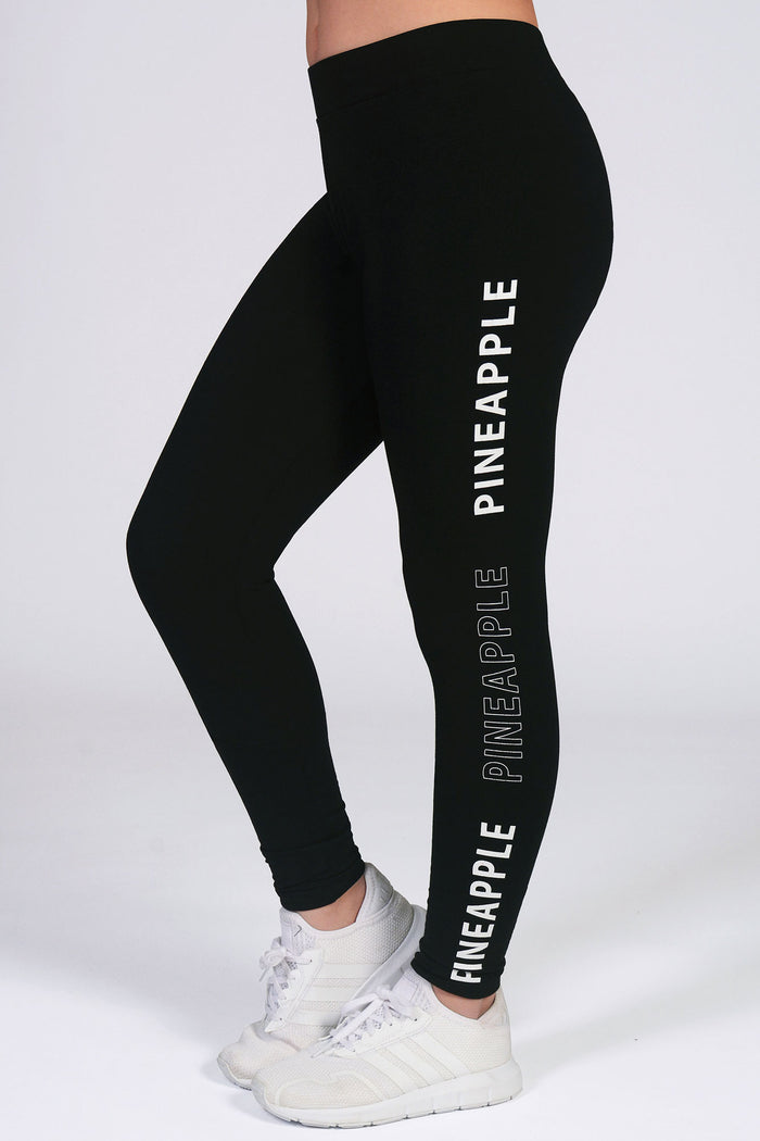 Girls' black leggings with Pineapple print along the side