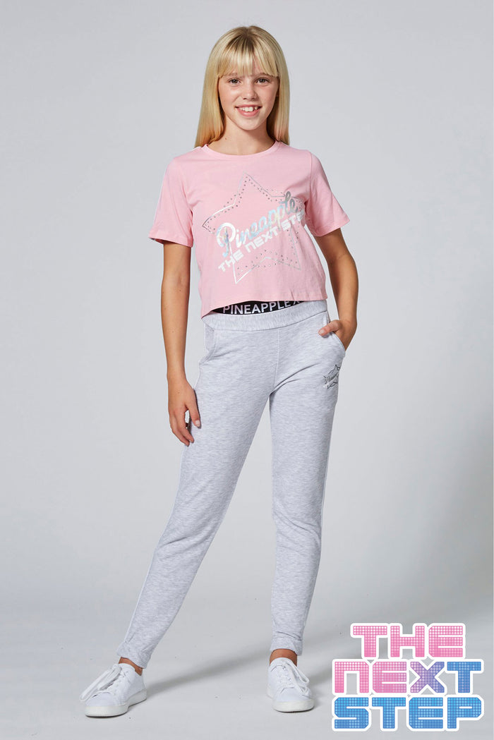 Girl wearing Pineapple X The Next Step Grey Joggers