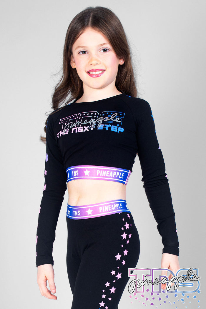 Girl wearing black TNS Long Sleeve Crop Top
