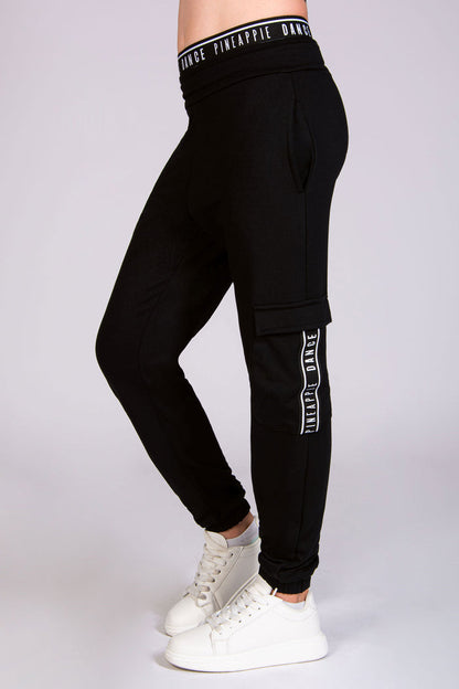 Shop girls' black cargo joggers online made out of soft cotton featuring multiple pockets.