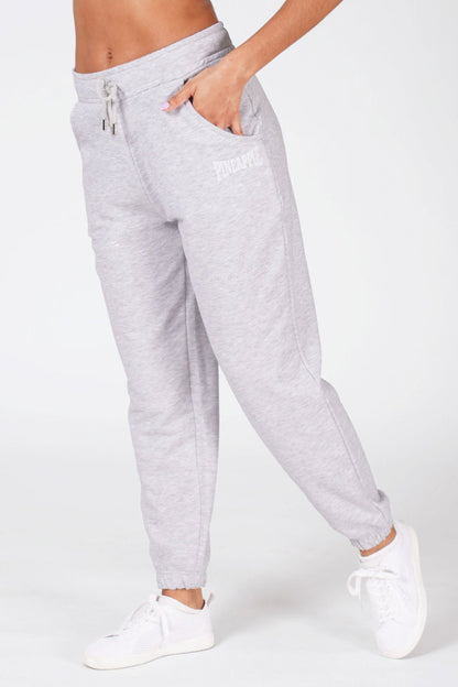 Woman wearing grey Pineapple oversized pocket joggers.