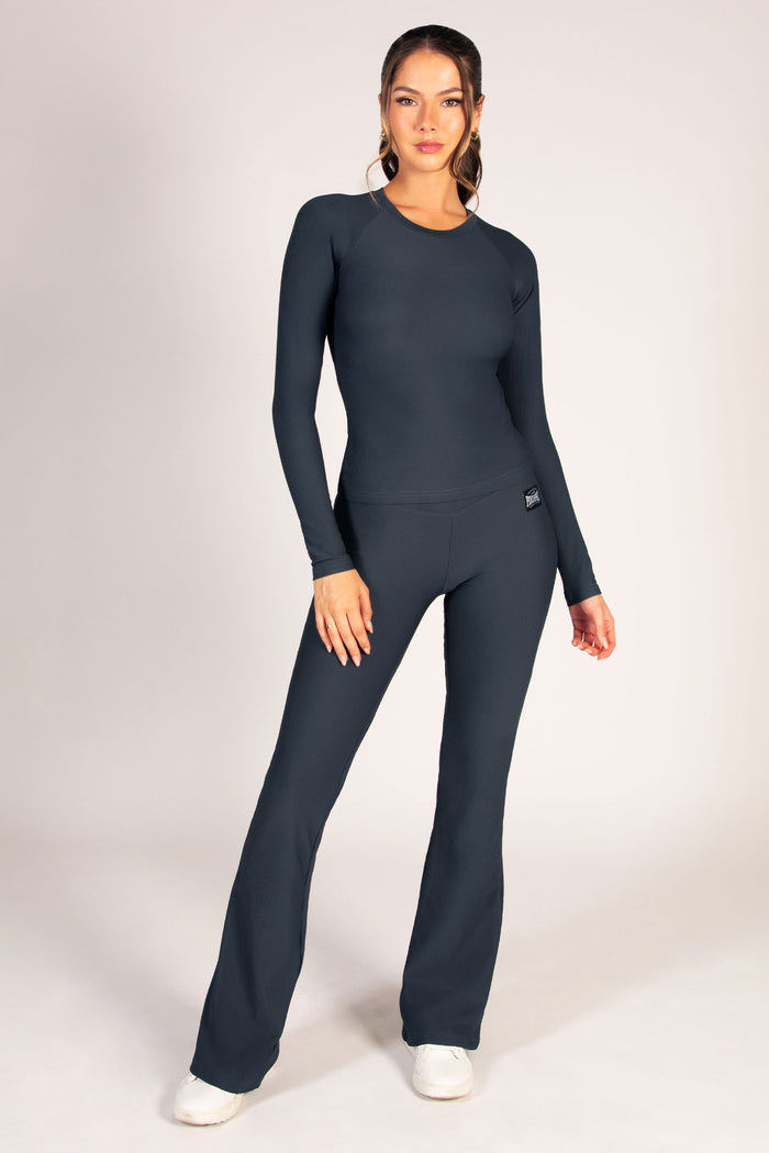 Women's rib gym set with long sleeve top and flared trousers, perfect for high impact workouts and hot girl walks.