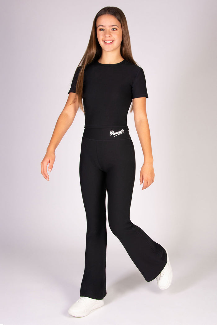 Black rib fitted top with short sleeves for girls, designed for active days and sports.