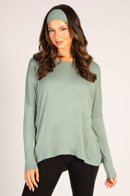 Women's viscose long sleeve top in sage with dipped back, a super soft fabric that fits all shapes.