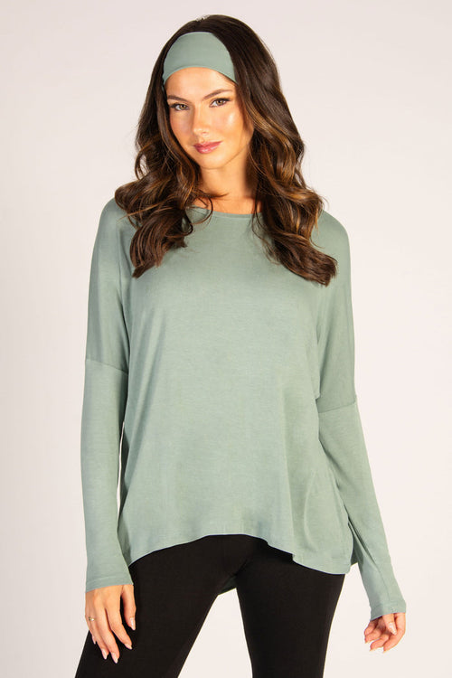 Women's viscose long sleeve top in sage with dipped back, a super soft fabric that fits all shapes.