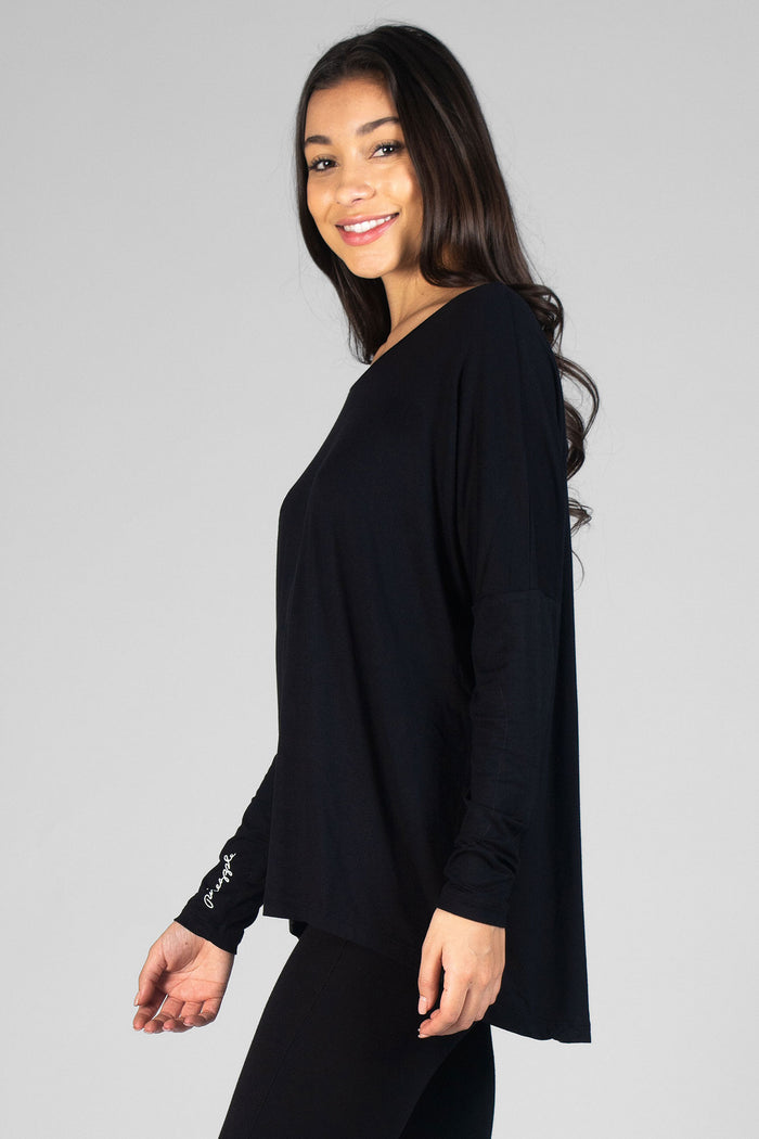 Woman wearing black Logo Long Sleeve Top