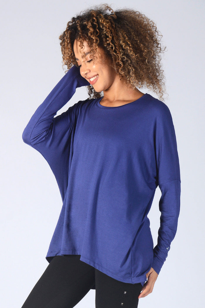 Woman wearing navy Long Sleeve T-Shirt with cuff logo