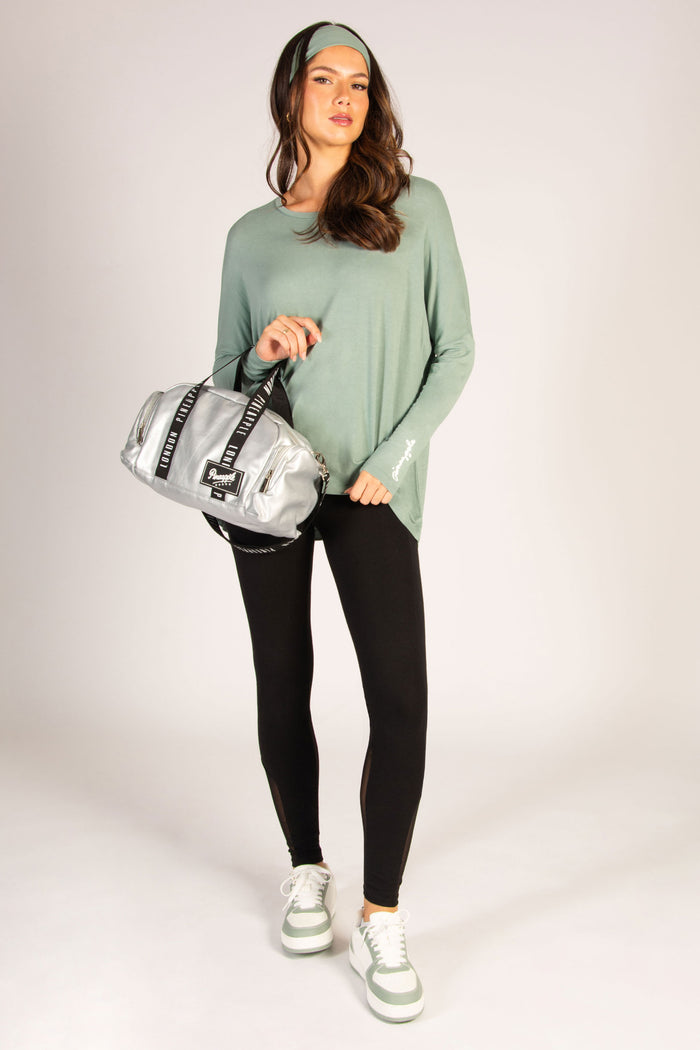 Women's viscose long sleeve top in sage with dipped back, a super soft fabric that fits all shapes.
