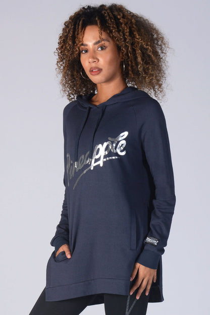 Woman wearing charcoal Side Slit Hoodie with silver logo