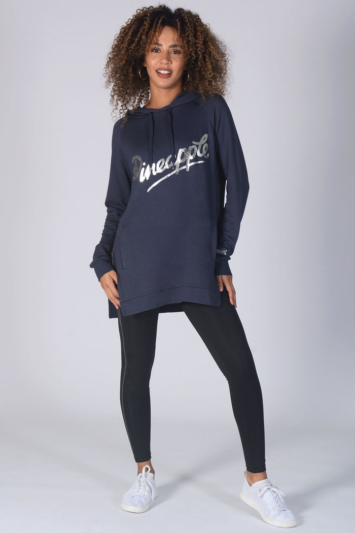 Woman wearing charcoal Side Slit Hoodie with black leggings