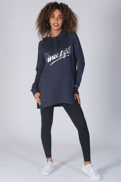 Woman wearing charcoal Side Slit Hoodie with black leggings