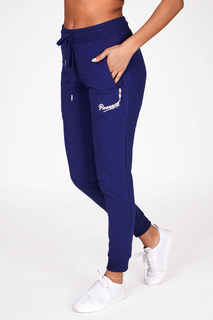 Woman wearing Pineapple Navy Skinny Zip Trousers