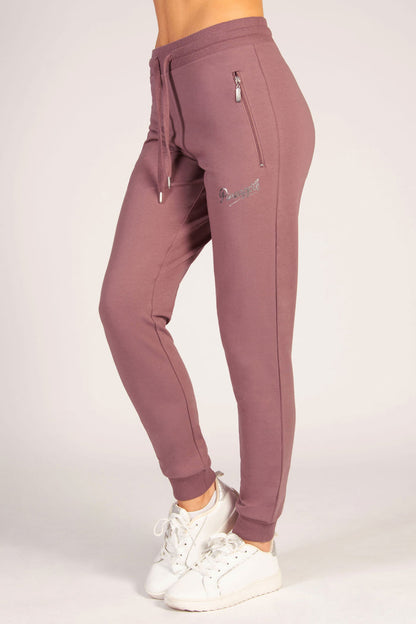 Women's joggers with zip side pockets, elasticated drawcord waistband in a lovely raisonette colour.