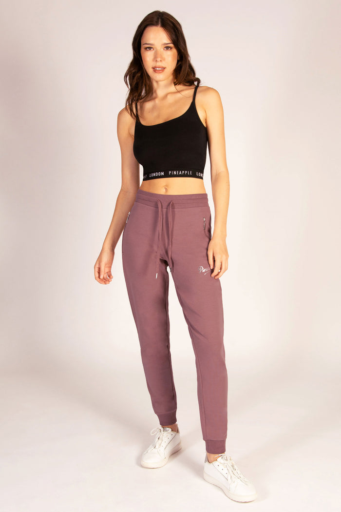Martyna Balsam wearing Pineapple athleisure joggers featuring two side pockets and a drawcord waistband.
