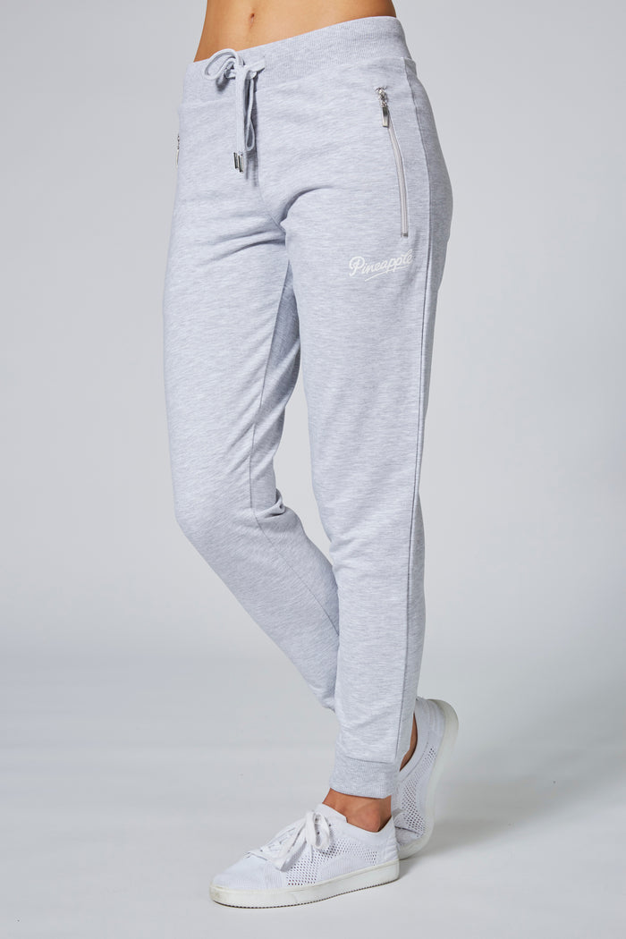 Woman wearing Pineapple Grey Skinny Zip Joggers