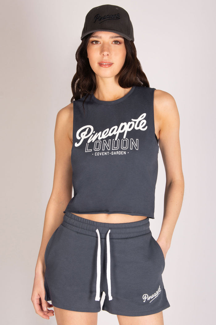 Women's raw edge vest top in dark grey 100% cotton fabric with Pineapple London Covent Garden print across the chest.