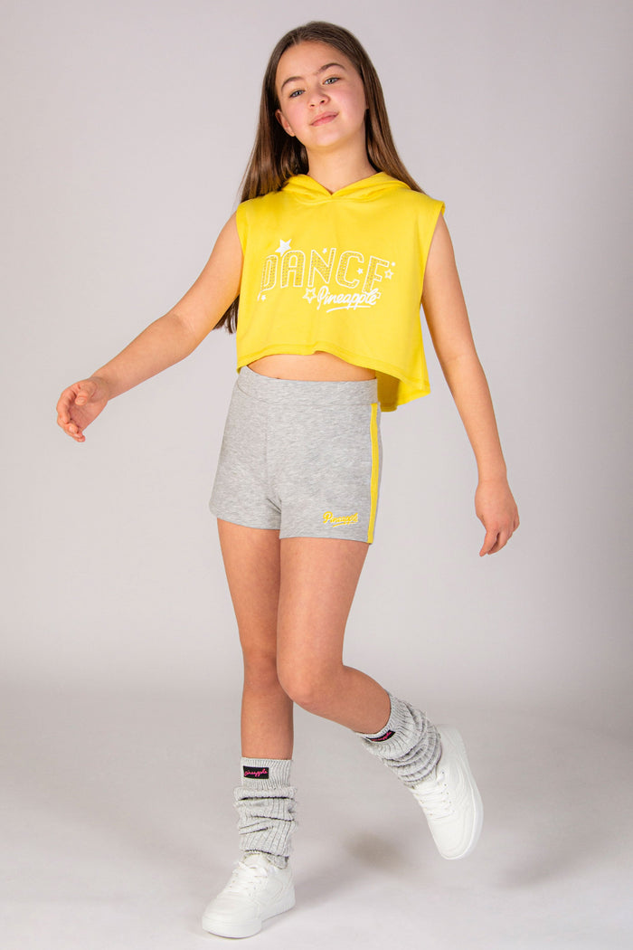 Girls' yellow dance hoodie in sleeveless style with raw edge hem and diamanté chest print.