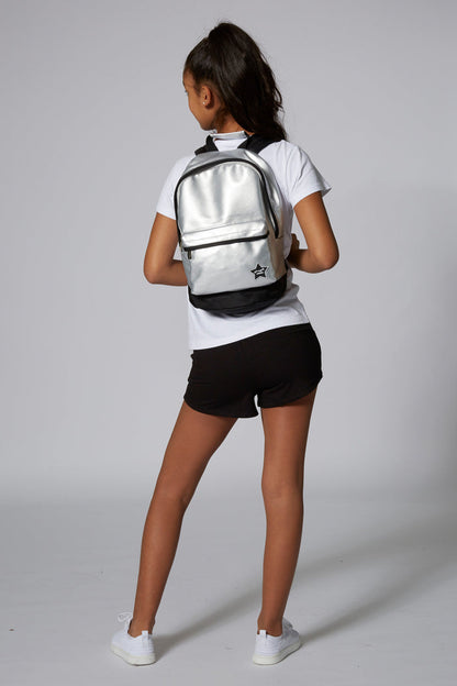 Girl carrying Dance Star Badge Backpack with pockets