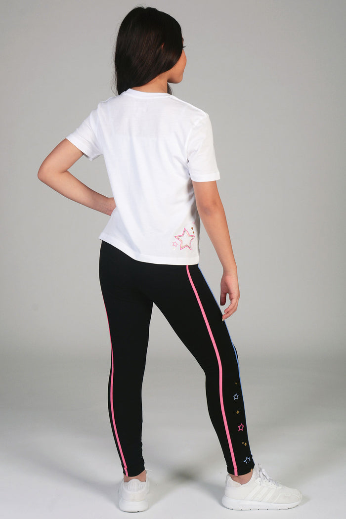 Black star piping leggings from Pineapple with white crop t-shirt for girls