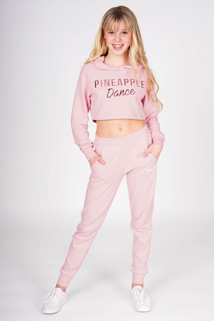 Girl wearing Pink Stripe Pocket Joggers and pink embossed crop hoodie